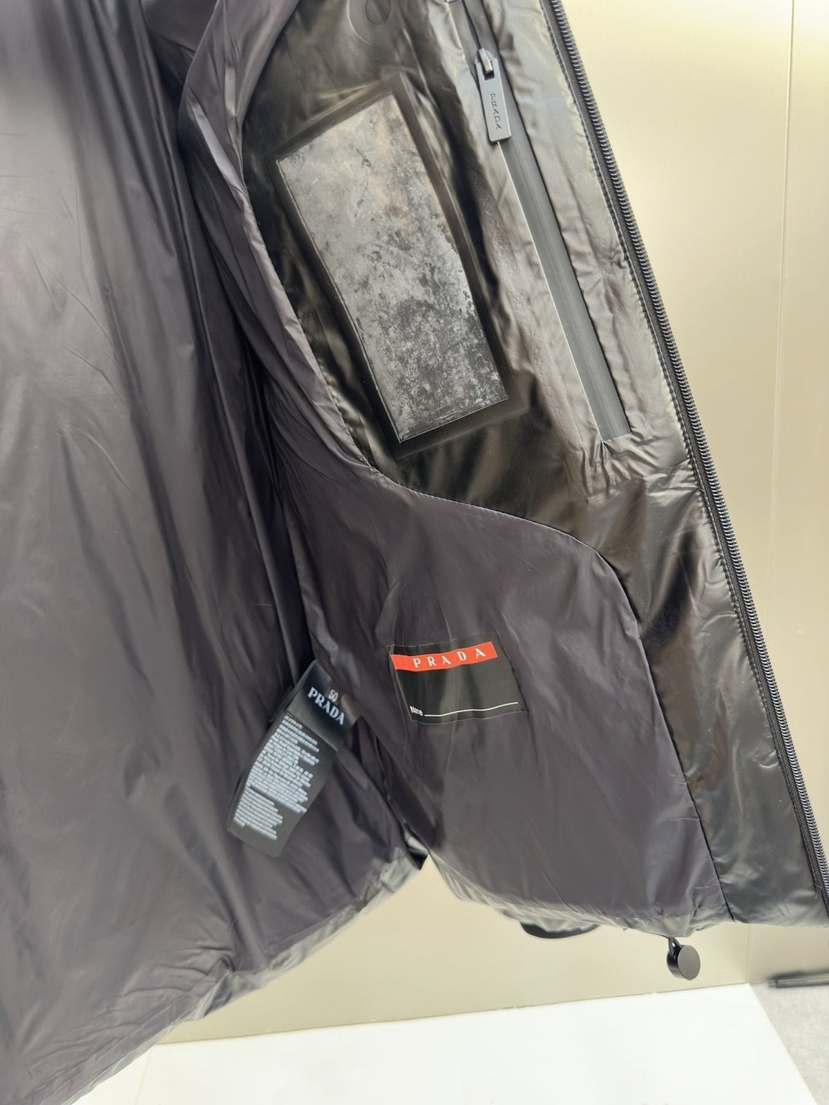 Prada Black Hooded Quilted Puffer Jacket — neck_label